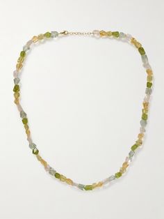 JIA JIA's necklace is hand-strung with an array of colorful stones - including peridot, lemon quartz and green amethyst - that are meant to evoke joy. If you look closely, you'll see each one is left in its natural form, making them truly unique. Adjust the slim gold chain between 18- and 19-inches, depending on your neckline. Fine Jewelry Green Necklace With Stones, Green Briolette Necklace In Fine Jewelry Style, Green Briolette Necklace Fine Jewelry, Green Faceted Necklace Fine Jewelry, Green Faceted Fine Jewelry Necklace, Fine Green Citrine Jewelry, Green Peridot Necklace In Fine Jewelry Style, Green Multi-stone Fine Jewelry Necklaces, Fine Jewelry Green Multi-stone Necklace