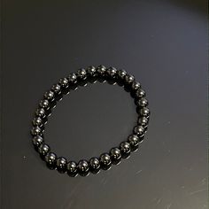 Add a touch of luxury and elegance to your style with our Black Obsidian Bracelet. Handmade with 6mm beads, this stretchy and unisex bracelet brings sophistication and exclusivity to any outfit. Stand out from the crowd and embrace the power of obsidian in your daily life. Brain Enhancement, Black Obsidian Bracelet, Obsidian Bracelet, Herbal Tea Blends, Unisex Bracelets, Black Obsidian, Bracelet Handmade, Daily Life, Gemstone Jewelry