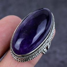 ------------------------------------------ Welcome to Our Shop Silverjewelexi ------------------------------------------ Natural Amethyst Rings, Big Size Oval Shape Cabochon Purple Gemstones, 925 Sterling Silver Vintage Ring, Gift For Mom Birthday, Gift For Him Description :- SKU:- ETC-4931 Metal:-  Sterling Silver Metal Purity:- 925 Gemstone:- Amethyst Gemstone Color:- Purple Gemstone Creation :- Natural Stone Setting :- Channel Ring Size:- 8 US Note: Due to the natural formation of this gemsto Shiny Ring, Rings Big, Purple Gemstones, Amethyst Rings, Gift For Mom Birthday, Shiny Rings, Mom Ring, Silver Polish, Party Kleidung