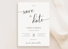 the save the date card is shown on top of a white sheet of paper with an elegant