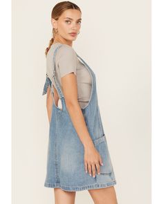 Denim Blue Dress With Adjustable Straps, Sleeveless Denim Shortalls With Pockets, Medium Wash Cotton Shortalls With Adjustable Straps, Cotton Cutoff Shortalls With Pockets, Denim Blue Cotton Dress With Adjustable Straps, Casual Medium Wash Denim Dress With Adjustable Straps, Casual Denim Dress With Adjustable Straps In Medium Wash, Casual Denim Blue Dress With Adjustable Straps, Casual Denim Pinafore Dress With Pockets