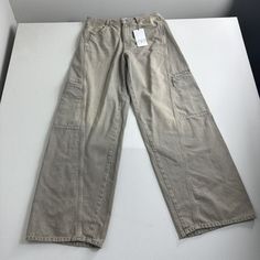 Zara Jeans Wide Leg Cargo Pants Women’s Size 10 Pockets Casual Mid-rise Beige Cotton Cargo Jeans, Khaki Full Length Jeans With Pockets, Full Length Khaki Jeans With Pockets, Khaki Baggy Mid-rise Jeans, Spring Khaki Jeans With Hip Pockets, Beige Full-length Casual Cargo Jeans, Khaki Straight Leg Bottoms With Patch Pockets, High Rise Beige Cotton Cargo Jeans, Beige High Rise Cotton Cargo Jeans