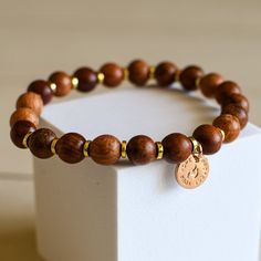 Embrace the essence of hope and faith with our "Protect Your Hope" Wooden Bracelet. This intricately crafted piece serves as a constant reminder of your inner strength and the enduring power of hope in your life. **Product Highlights:** 🌳 **Natural Beauty:** Each bead of this bracelet is made from exquisite wooden material, celebrating the beauty of nature and simplicity. 🙏 **Faithful Inspiration:** Engraved with the words "Protect Your Hope” on the front and “It can’t be taken, only given awa Highlights Natural, Hope Gifts, Wooden Bracelet, Inner Strength, Wooden Beads, Natural Beauty, Jewelry Collection, Essence, Highlights