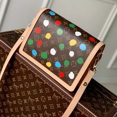 Features: M46432 The LVxYK Dauphine MM joins the “Painted Dots” theme as part of the exclusive Louis Vuitton x Yayoi Kusama collection. The venerable Japanese artist is known for her use of dots, an emblematic motif for her since childhood. In this version of the Dauphine, rainbow-colored dots adorn Monogram canvas, screen-printed with a 3D hand-painted effect. A high-spirited new look that brings fresh creative energy to a classic bag. 9.8 x 6.7 x 4.1 inches (length x Height x Width) 25 x 17 x 11 cm Monogram coated canvas with 3D Painted Dots print Natural cowhide-leather trim Microfiber lining Gold-color hardware Inside LVxYK signature Magnetic front lock 2 inside compartments Zipped middle pocket Inside back flat pocket Strap:Removable, adjustable Strap drop: 9.8 inches Strap drop max: Cm Monogram, Louis Vuitton X Yayoi Kusama, Mm Monogram, 3d Hand, Louis Vuitton Purse, Yayoi Kusama, Lv Handbags, Classic Bags, Japanese Artists