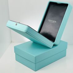 an open box with a cell phone in it