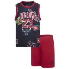 Gear up your little boys for playdates, sensory classes, and everything beyond with the Jordan 23 Printed Jersey Set. A cute tribute to greatness, this two-piece set completes your little ones’ look with a sleeveless top and matching shorts. The top boasts a crew neck for a snug feel and a Jordan logo on the chest to add an iconic hoop flair to your kiddos’ look. The shorts feature an elastic waistband and a Jumpman logo on the leg to help your little powerhouses make adorably dynamic moves in c Playful Sports Cotton Sets, Sporty Cotton School Sets, Black Graphic Print Playwear Sets, Red Cotton Sports Set, Black Graphic Print Sets For Playwear, Sporty Red Playwear Set, Red Sporty Playwear Sets, Red Casual Playtime Sets, Red Sporty Playtime Sets