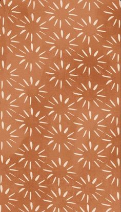 an orange and white pattern on fabric