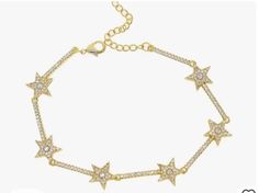 This trendy crystal star bracelet looks great on its own or stacked with other your other favorite bracelets. Fits a 7 inch wrist and has a 2 inch extender chain on the end. Available in gold plated stainless steel only. Crystal Stars, Star Bracelet, Stackable Bracelets, Chain Link Bracelet, Link Bracelets, Chain Link, Cross Necklace, The End, Jewelry Bracelets