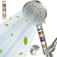 the shower head is spraying water from it's sprinkles and leaves