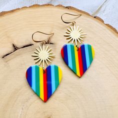 These rainbow heart earrings are the perfect goth punk witchy Galentine's day jewelry! They would make great pride unique gifts for a sister in her birthday!  This is a pair of awesome rainbow heart earrings. I made them using brass components, brass jump rings, acrylic hearts, and brass ear wires. All orders ship the next business day.  Ear wires are lead and nickel free.  ......... Back to the shop: www.etsy.com/shop/samesunsetdesign Follow Me:  * IG: @samesunsetdesign * FB: https://www.facebook.com/samesunsetdesign Thank you so much for visiting my shop!  All my jewelry is handmade with great care and love, using only quality materials.  Please let me know if you have any questions as I am happy to answer all inquiries. Heart-shaped Pierced Earrings For Festivals, Retro Rainbow Earrings For Gift, Nickel-free Heart Earrings For Festivals, Nickel Free Heart Earrings For Festivals, Whimsical Nickel-free Heart Earrings, Punk Heart-shaped Earrings, Punk Heart-shaped Pierced Earrings, Artsy Heart-shaped Earrings For Gifts, Rainbow Heart-shaped Earrings As Gift