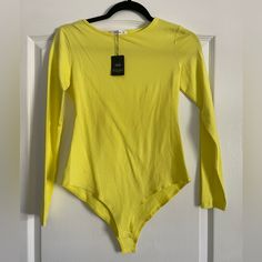 Bright Yellow Mangdiup Long-Sleeve Bodysuit In Small, Never Worn. New With Tags Spring Solid Long Sleeve Bodysuit, Trendy Long Sleeve Bodysuit For Fall, Spring Long Sleeve Solid Bodysuit, Spring Long Sleeve Bodysuit, Trendy Solid Color Cotton Bodysuit, Solid Color Long Sleeve Bodysuit For Spring, Spring Solid Color Long Sleeve Bodysuit, Long Sleeve Solid Color Bodysuit For Spring, Fitted Solid Color Bodysuit With Crew Neck