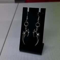 Silver claw earrings on fish hook ear wires  Comes with silicone backs matching necklace available ️ Arrives in pretty packaging ✨ Halloween Accessories Jewelry, Claw Earrings, Earrings Halloween, Jewellery Gifts, Mythical Creature, Pretty Packaging, Halloween Accessories, Matching Necklaces, Fish Hook