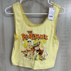 Juniors Mellow Yellow Sleeveless Crop Top Shirt The Flintstones Family Size Xl. Yellow Sleeveless Y2k Top, Y2k Cotton Vest Top, Yellow Sleeveless Cotton Tops, Yellow Cotton Vest Top, Y2k Cotton Tank Top, Y2k Style Cotton Tank Vest, Lemon Shirt, The Flintstones, Crop Top Shirt