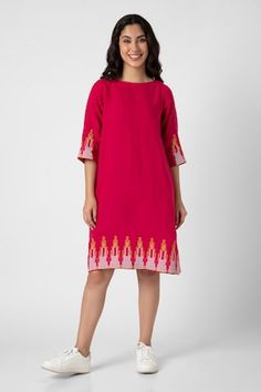 Hot pink dress with neon stuf embellishment in NY pattern on border. - Aza Fashions Resham Embroidery Midi Dresses, Festive Pink Dress With Embroidered Neckline, Festive Dresses With Embroidered Neckline, Festive Pink Midi Dress, Pink Embroidered Straight Kurta Dress, Summer Embroidered Straight Kurta Dress, Pink Straight Kurta Dress For Summer, Pink Embroidered Fitted Midi Dress, Fitted Pink Dress With Resham Embroidery