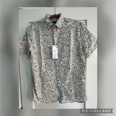 Mens Denim & Flower Short Sleeve Shirt Size Large. Floral Design New With Tags Casual Patterned Shirt With Relaxed Fit, Casual Patterned Short Sleeve Shirt For Summer, Patterned Casual Short Sleeve Shirt Relaxed Fit, Casual Short Sleeve Shirt With Floral Print, Casual Patterned Short Sleeve Shirt, Relaxed Fit, Casual Relaxed Fit Patterned Short Sleeve Shirt, Casual Patterned Relaxed Fit Short Sleeve Shirt, Casual Patterned Cotton Shirt, Casual Floral Print Shirt With Relaxed Fit