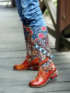 With a stunning floral print design and a cow leather construction, these boots take your footwear game to the next level and ensure a bold look. 1.57'' heel 14.8 shaft 14.2 circumference Zip closure Genuine leather upper Leather / Textile lining Leather footbed Leather midsole Rubber sole Cowgirl Things, Whimsical Shoes, Art Boots, Look Hippie Chic, Bohemian Boots, Western Shoes, Breakfast Casseroles, Festival Ideas, Hippie Top