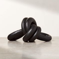 two black rings sitting on top of each other