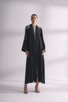 Look elegant and chic in this stunning Zania Floral Maxi Dress in Navy. Perfect for any occasion, this abaya-style dress features a long maxi length with a button front design, creating a sophisticated shirt dress look. The gathered waist and included belt accentuate your waistline for a flattering silhouette. Product Features: - Abaya-style dress for a modest yet stylish look. - Long maxi length for a graceful and elegant appearance. - Button front design for a classic shirt dress look. - Gathe Abaya Style, Evening Jumpsuit, Classic Shirt Dress, Maxi Dress Formal, Stone Work, Abaya Fashion, Long Maxi, Shirt And Pants, Floral Maxi