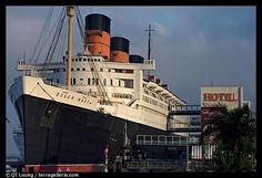 a large cruise ship docked at the dock