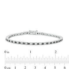 Brighten up your favorite day or evening looks with the classic elegance of this black and white diamond alternating tennis bracelet. Crafted in sterling silver Alluring 1/15 ct. black diamonds alternate with dainty white diamonds - artfully set to enhance size and sparkle. Captivating with 2-3/4 cts. t.w. of diamonds This 7.0-inch bracelet secures with a tongue and groove clasp. Classic Round Black Diamond Bracelet, Formal Tennis Bracelet With Black Diamonds, Classic Black Diamond Tennis Bracelet, Black Diamond Round Bracelet, Classic Tennis Bracelet With Black Diamonds For Formal Occasions, Classic White Gold Diamond Bracelet With Black Diamonds, Formal Diamond Bracelet With Black Diamonds, Classic White Gold Bracelets With Black Diamonds, Formal White Gold Diamond Bracelet With Black Diamonds