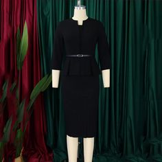 This dress is made from a lightweight polyester material, perfect for all seasons. Its regular fit and slight stretch provide comfort and the V-neck neckline and empire waistline create a polished, office lady style. The three quarter sleeves are adorned with sashes, and the dress falls to a mid-calf length, creating a flattering sheath silhouette. Designed in Mainland China, this dress is suitable for middle-aged women and is available in a solid color pattern with a pullover closure. Its fabric composition is primarily natural fiber with a hint of polyester, making it a durable and stylish choice. Office Lady V-neck Midi Dress, Office Lady Style V-neck Midi Dress, V-neck Office Lady Dress For Business Casual, Career V-neck Dresses For Fall, Tailored Black Dress For Office Wear, Office Lady V-neck Midi Dress For Workwear, Office Lady Black Midi Dress For Work, Solid Office Lady Dresses For Office Wear, Office Lady Solid Color Dresses For Work