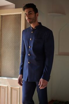 Blue full sleeve bandhgala in wool base fabric with stand collar. Paired with a pant. - Aza Fashions Classic Bandhgala For Festive Workwear, Classic Bandhgala For Workwear And Festive Occasions, Classic Festive Bandhgala For Workwear, Classic Bandhgala With Stand Collar For Festive Occasions, Classic Fitted Ceremonial Bandhgala, Fitted Classic Ceremonial Bandhgala, Classic Fitted Bandhgala For Ceremonial Occasions, Traditional Bandhgala With Buttons For Workwear, Classic Ceremonial Bandhgala With Long Sleeves