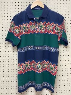 Mens Nautica Small Floral Hawaiian S Polo Golf Shirt Striped. No damage or stains. Shipping $6 in the USA. Green Cotton Polo Shirt With Graphic Print, Vintage Green Short Sleeve Polo Shirt, Vintage Green Polo Shirt With Polo Collar, Vintage Blue Short Sleeve Polo Shirt, Vintage Green Cotton Polo Shirt, Blue Vintage Short Sleeve Polo Shirt, Vintage Blue Polo Shirt, Polo Golf, Golf Shirt