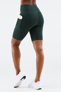 High-Waisted SculptKnit® Pocket Short Fabletics green female Activewear >> Womens >> Bottoms >> Leggings >> Capris regular Green Functional Yoga Bottoms, Versatile Green Sports Bottoms, Green Compression Sportswear Bottoms, Green Activewear For Gym With Elastic Waistband, Green Activewear With Elastic Waistband For Gym, Green Stretch Athleisure Bottoms, Green High Stretch Short Activewear, Sporty Green Yoga Bottoms, Green Activewear With Elastic Waistband For Training