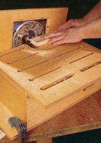 a person using a router to cut wood with a circular sawtoothing tool