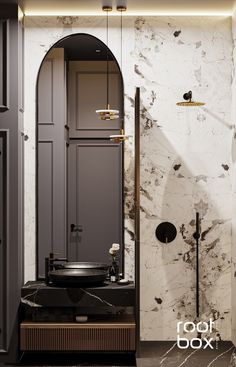 an elegant bathroom with marble walls and flooring