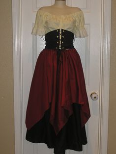 a woman's dress on display in front of a door