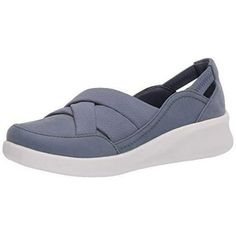 Women's Clarks, Sillian 2.0 Star Slip-On. This sporty slip-on is part of the Clarks Cloudsteppers collection, so you know it's going to be comfortable. The soft, stretchy fabric bands in the upper and contoured shoe design ensure a great fit.. Fabric upper with soft, stretchy neoprene topline Lightweight style for easy wearing comfort Soft fabric lining Removable moisture-wicking Ortholite footbed with Cushion Soft foam Rubber outsole for added durability Part of the Clarks Cloudsteppers Collect Clarks Cloudsteppers, Penny Floor, Shoe Design, Womens Clarks, Stretchy Fabric, Soft Fabric, Designer Shoes, Moisture Wicking, Blue Grey