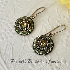 Stunning Vintage Swarovski Crystal filigree bead earrings. Perfect for any occasion. Peridot, light green and topaz (yellow) 3-layer vintage Swarovski Crystal filigree components hang from 14K gold fill handcrafted ear wires. Bead size 15MM. Topaz Yellow