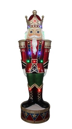 LED Nutcracker Polyresin Statue HI-LINE GIFT LTD. Madonna Statue, Colored Led Lights, Santa Mugs, Warm Christmas, Crowd Pleaser, Nutcracker Christmas, Christmas Music, Deck The Halls, Garden Statues