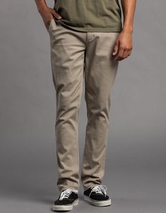 Rsq Slim Chino Pants. Twill Chino With Stretch. Flat Front. Side Slip Pockets. Back Welt Pockets With Rsq Logo On Left Pocket Opening. Button Waist With Zip Fly. Approx Leg Opening: 14.5". 97% Cotton 3% Spandex. Machine Wash. Imported. Model Is 6'1" Wearing A Size 32x32. Slim Chinos, Pants Vintage, Chino Pants, Chinos Pants, Welt Pockets, Welt Pocket, Mens Jeans, Spandex, Wardrobe