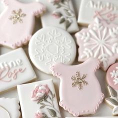 some decorated cookies with frosting on them