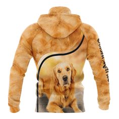 an orange and white dog on a hoodie