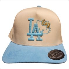 a baseball cap with the los angeles dodgers on it