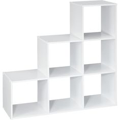 a white shelf unit with six cubes on each side