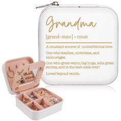 an open white box with jewelry inside and the words grandma in gold lettering on it