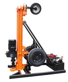 an orange truck mounted to the back of a fork lift with wheels on it's sides