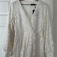 White With Sequins Embroidery All Over Dress Long Length Size Small Used Once With Tags Elegant Floral Embroidered Dress For Wedding Night, Elegant Floral Embroidery Dress For Wedding Night, Embroidered White Dress For Wedding Guest, White Dresses With Intricate Embroidery For Party, Formal White Sequined Wedding Dress, White Embroidered Wedding Dress For Party, Elegant Embroidered Dress For Wedding Night, Elegant Embroidered Wedding Night Dress, Fitted Embroidered Dress For Wedding Night