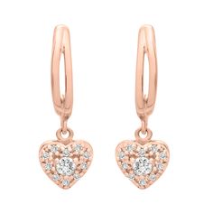 With a heart-shaped charm filled with stunning diamonds, the Etta earrings add a romantic touch to every outfit. These beautiful diamond heart drop earrings will add character and sparkle to your everyday collection.  Available in 10K and 14K yellow gold, white gold, and rose gold Length: 15. 94 mm / Width: 5. 42 mm  SI1 Diamond Clarity  H-I Diamond Color  Total Carat weight: 1/10 CT  Ethically sourced materials and conflict-free diamonds  Fully compliant with The Kimberley Process To keep your Rose Gold Diamond Heart Cut Earrings, Rose Gold Heart Cut Diamond Earrings, Rose Gold Heart Earrings With Diamond Accents, Rose Gold Heart Cut Earrings With Diamond Accents, Luxury Heart-shaped Drop Earrings For Valentine's Day, Heart-shaped Rose Gold Earrings With Diamond Accents, Heart Shaped Rose Gold Earrings With Diamond Accents, Elegant Rose Gold Diamond Heart Earrings, Luxury Rose Gold Heart Earrings