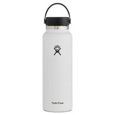 the hydro flask water bottle is white and has a black lid