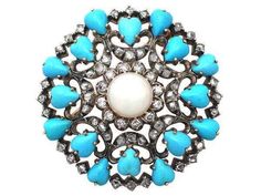 Handmade item  Recycling: No Gemstone: Rose cut diamonds, Turquoise & Pearl Brooch weight: 18.960 Grams  Diamond weight: 2.05 carats  Diamond colure: Light Tinted Brown  Diamond shape: Round  Turquoise weight: 8.15 carats  Turquoise: Lab created  Pearl weight: 1.36 carats  Brooch Length: 2.00 inch  Material: Silver  Sterling silver purity: 925 Brooch Finished: Antique & Gold Gemstone Brooch, Antique Turquoise, Gold Brooch, Diamond Brooch, Gold Brooches, Pearl Brooch, Victorian Jewelry, Antique Jewellery, Silver Turquoise