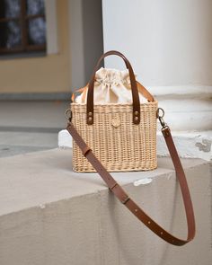 Luxury wicker summer straw bag with leather handles and long adjustable strap, have inside cotton bag. It is carefully hand-made by local artisans. This fashionable, stylish and environmentally-friendly basket is perfect for everyday use or going out. Basket have fantastic proportions and handle that perfectly fit into your hand. Wicker basket can be ideal gift for your mum, sister or friend! Features: - a precisely handmade basket made in Lithuania - made from all-natural, eco-friendly and sust Basket Purse Outfit, Wicker Handbags, Jane Birkin Basket, Rattan Bags, Purse Outfit, Basket Purse, Wicker Purse, Rectangular Baskets, Straw Purse