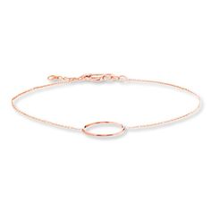 Classic, yet modern, this pretty bracelet for her features a circle of 14K rose gold. The circle attaches to a 7.5-inch cable chain secured with a lobster clasp. Modern Delicate Chain Rose Gold Bracelets, Modern Round Rose Gold Bracelets, Modern Rose Gold Round Bracelets, Modern Rose Gold Open Circle Jewelry, Modern Circular Rose Gold Jewelry, Modern Rose Gold Round Chain Bracelet, Minimalist Rose Gold Oval Link Bracelet, Rose Gold Round Bracelet With Delicate Chain, Dainty Rose Gold Round Chain Bracelet