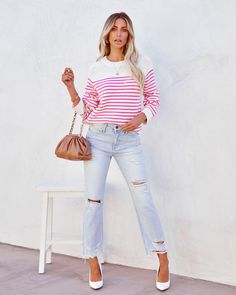 Relaxed Fit 100% Cotton Hand Wash Cold. Dry Flat High Neckline Long Sleeves Ribbed Edges Knit Fabrication No Closures Not Lined Cozy and casual. the Stella Cotton Striped Sweater features white and pink stripes and a crew neckline.Styled with: Zen Hoops. Compass Coin Necklace. Simple Bangle. Chic Bag. Statement Denim. and Demure Pumps. ---SIZE AND FIT---Model is Wearing a Size Small. Height is 5'7". Bust is 32". Waist 25". and Hips 30" Size XS: Length measures 23" from shoulder to hem with a 34" Simple Bangle, Lace Shift Dress, Rhinestone Dress, Necklace Simple, Bell Sleeve Dress, Coin Necklace, Embellished Dress, Dress Cuts, Striped Sweater