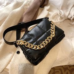 • Main Material: PU• Closure Type: Hasp• Lining Material: Polyester• Number of Handles/Straps: Two• Interior: Cell Phone Pocket• Decoration: Chains• Item # 49176712• Size: 15"W x 9"H x 4"D• Import Product• Shipping Worldwide Trendy Leather Bags With Gold Chain, Leather Shoulder Bag With Gold Chain For Party, Leather Bag With Chain Strap For Fashion, Rectangular Faux Leather Shoulder Bag For Fashion, Trendy Leather Bag With Chain Detail, Trendy Leather Shoulder Bag With Chain, Chic Faux Leather Shoulder Bag With Chain Strap, Evening Shoulder Bag With Chain Strap In Faux Leather, Evening Faux Leather Shoulder Bag With Chain Strap