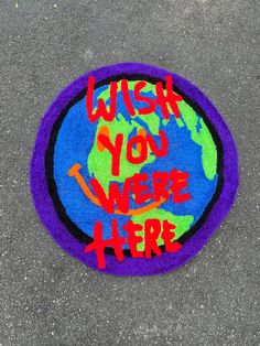 a rug with the words wish you were here on it